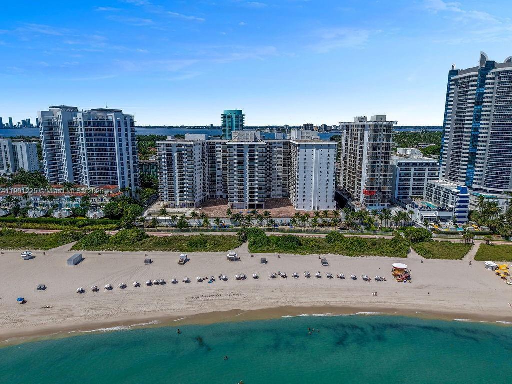 6039 Collins Avenue, Unit 1402 Miami Beach, FL 33140 - Photo 33 of 45 a view of a city with tall buildings