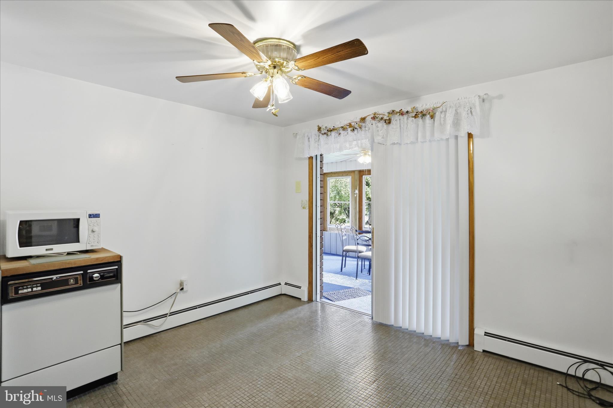 199 Buser Street Ridgeley, WV 26753 - Photo 31 of 49 wooden floor in an empty room with a window