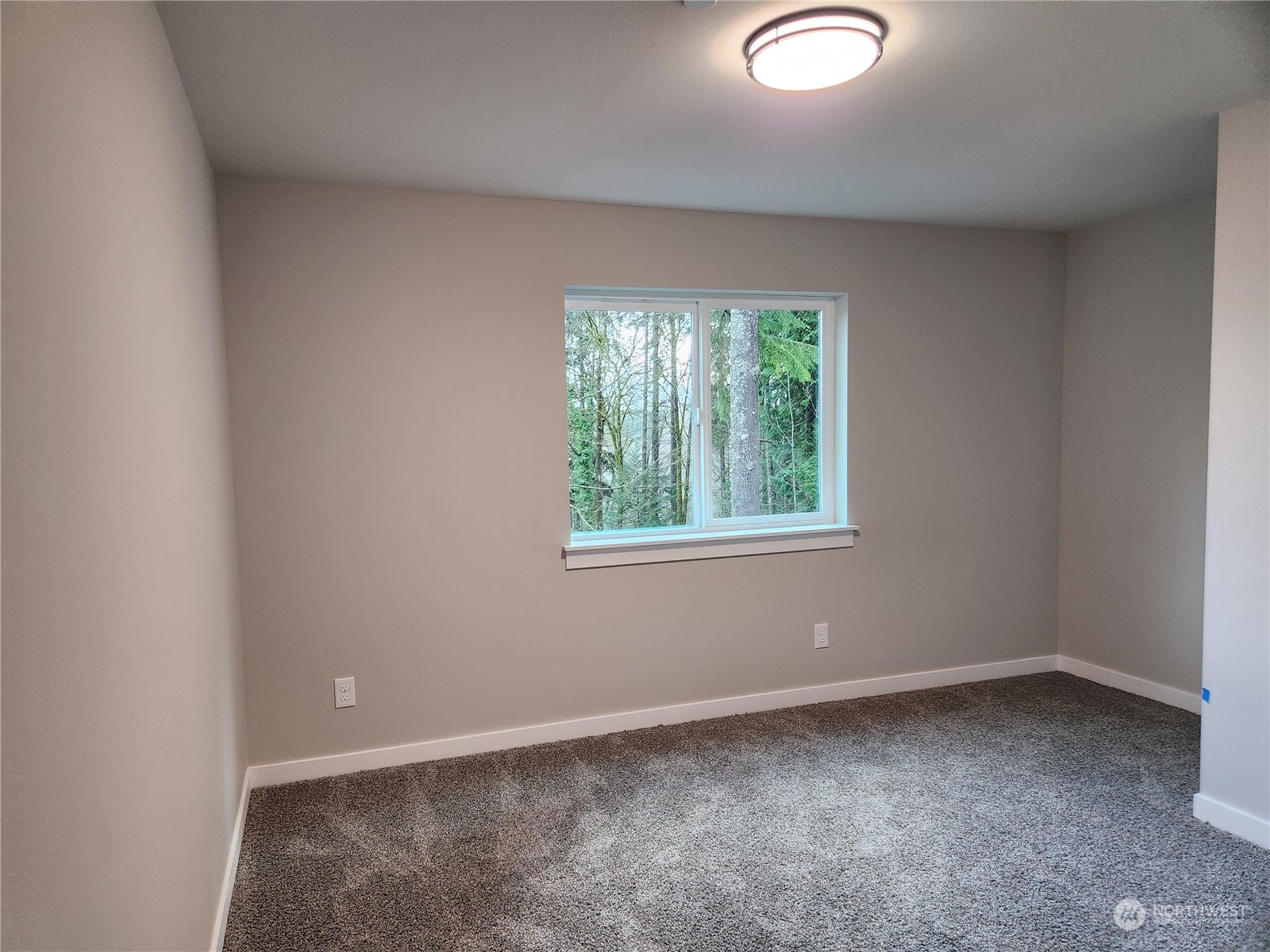 5948 Sidney Road Southwest Port Orchard, WA 98367 - Photo 7 of 10 an empty room with a window