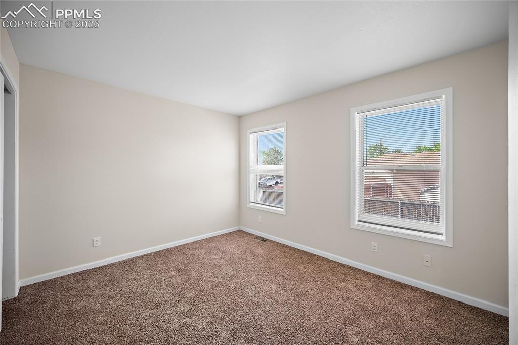 4400 Rawhide Road, Unit 157 Pueblo, CO 81008 - Photo 26 of 36 an empty room with windows