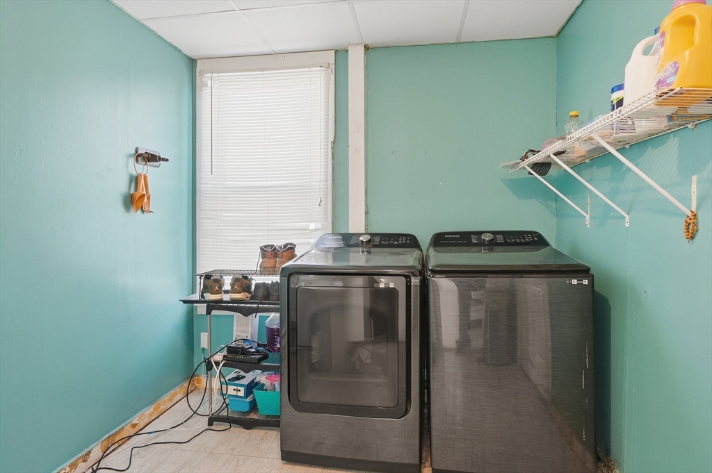 5 Ripley Place Worcester, MA 01610 - Photo 14 of 28 a utility room with dryer and washer