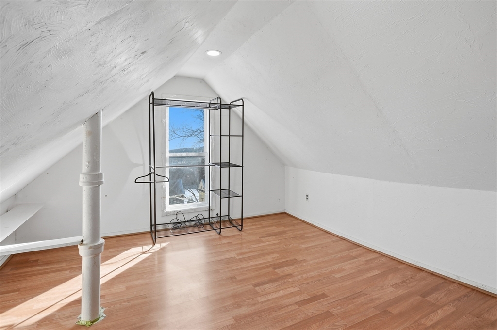 5 Ripley Place Worcester, MA 01610 - Photo 24 of 28 wooden floor in an empty room with a window