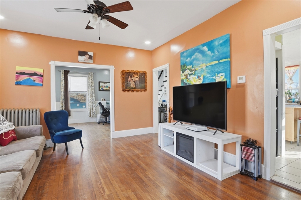 5 Ripley Place Worcester, MA 01610 - Photo 4 of 28 a living room with furniture and a flat screen tv