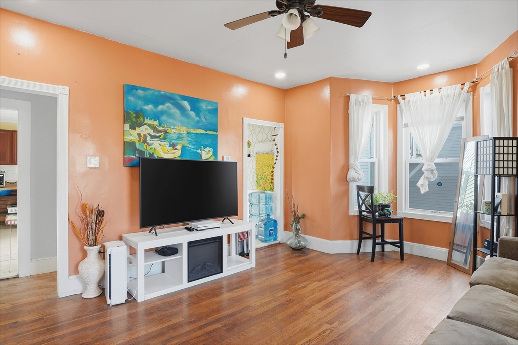 5 Ripley Place Worcester, MA 01610 - Photo 5 of 28 a living room with furniture and a flat screen tv