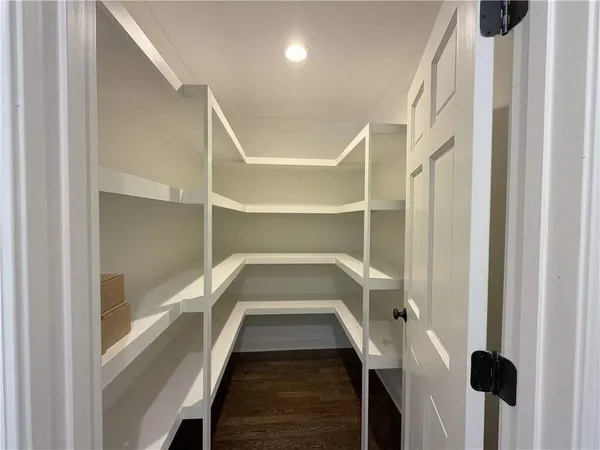 a kitchen with a sink cabinets and window