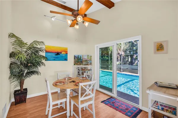 a view of a livingroom with furniture and a potted plant