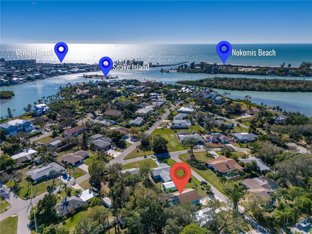 521 Pameto Road Nokomis, FL 34275 - Photo 39 of 41 an aerial view of a houses with a swimming pool