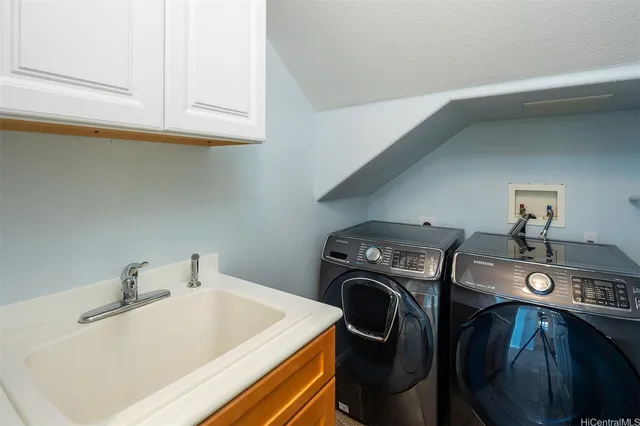 a utility room with dryer and washer