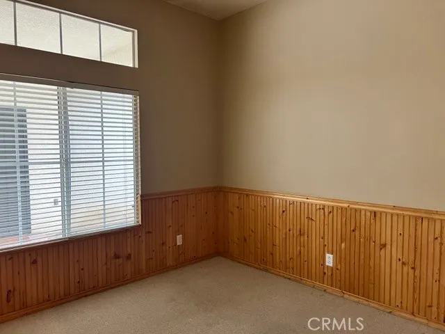 an entryway view with wooden floor