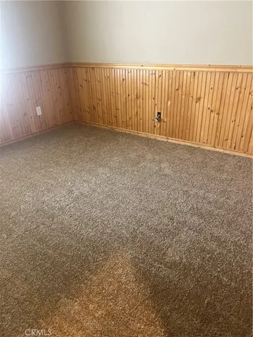 an entryway view with wooden floor