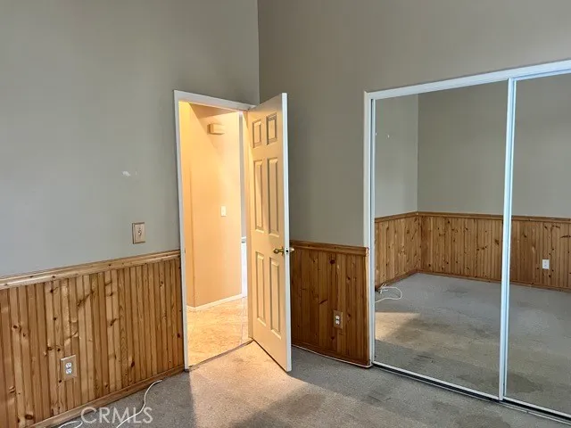 a view of a bathroom with a glass door