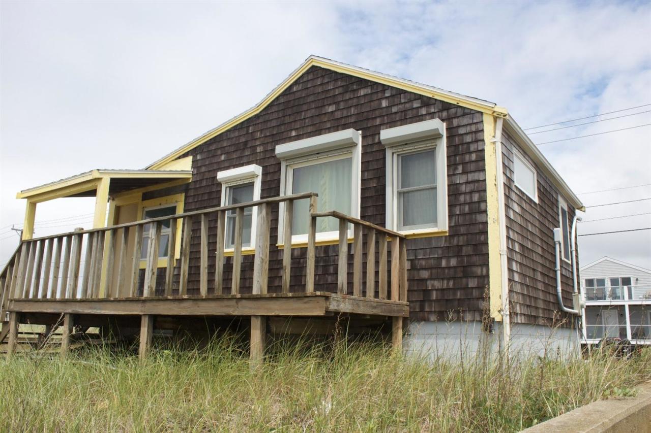 242 Shore Road Truro, MA 02666 - Photo 1 of 25 a house view with a garden space
