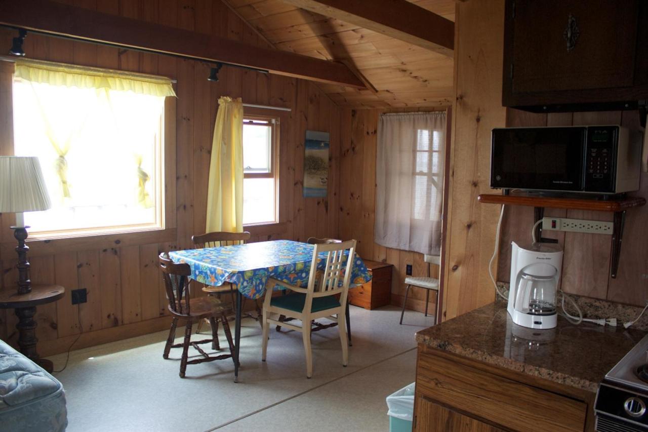 242 Shore Road Truro, MA 02666 - Photo 23 of 25 a dining room with furniture and window