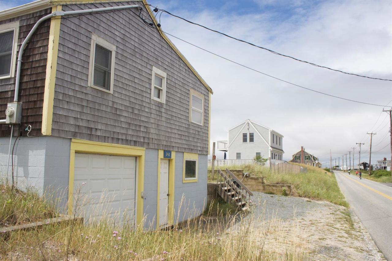 242 Shore Road Truro, MA 02666 - Photo 25 of 25 a view of a house with a yard