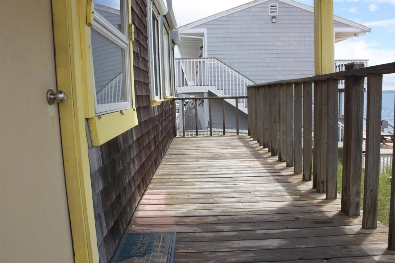 242 Shore Road Truro, MA 02666 - Photo 5 of 25 a view of balcony with wooden floor and stairs