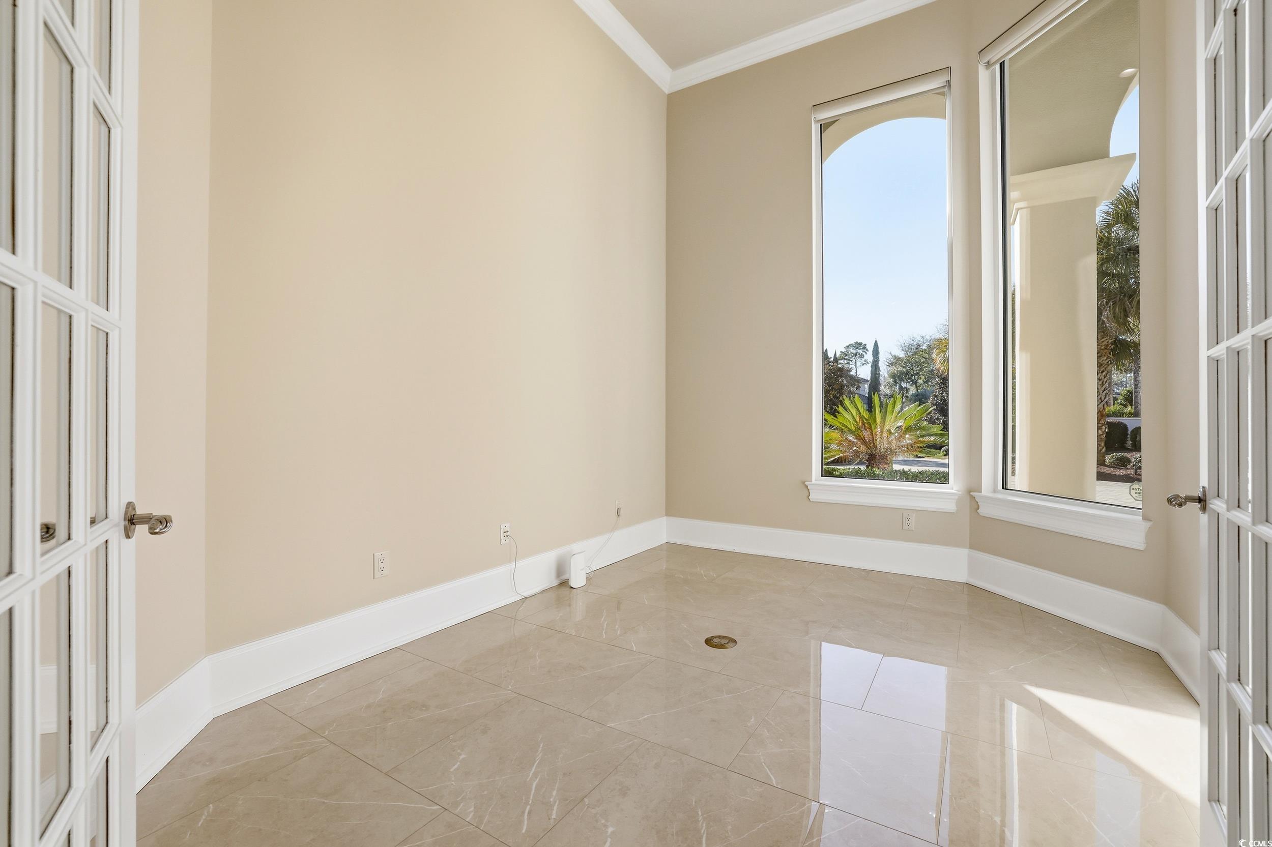 345 Posada Drive Myrtle Beach, SC 29572 - Photo 13 of 40 Office featuring crown molding, french doors, and light marble finish flooring