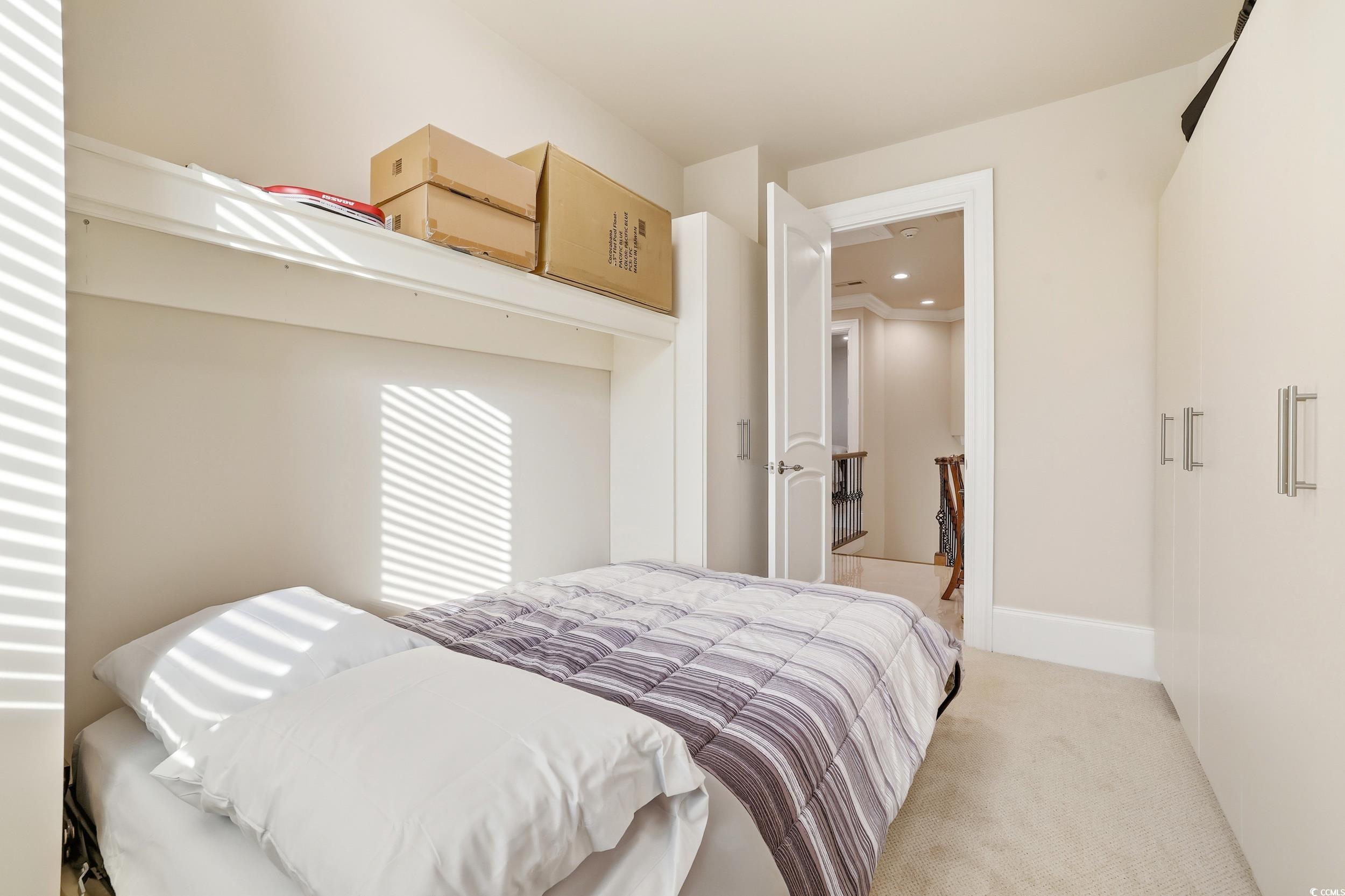 345 Posada Drive Myrtle Beach, SC 29572 - Photo 18 of 39 Carpeted bedroom with Murphy Bed
