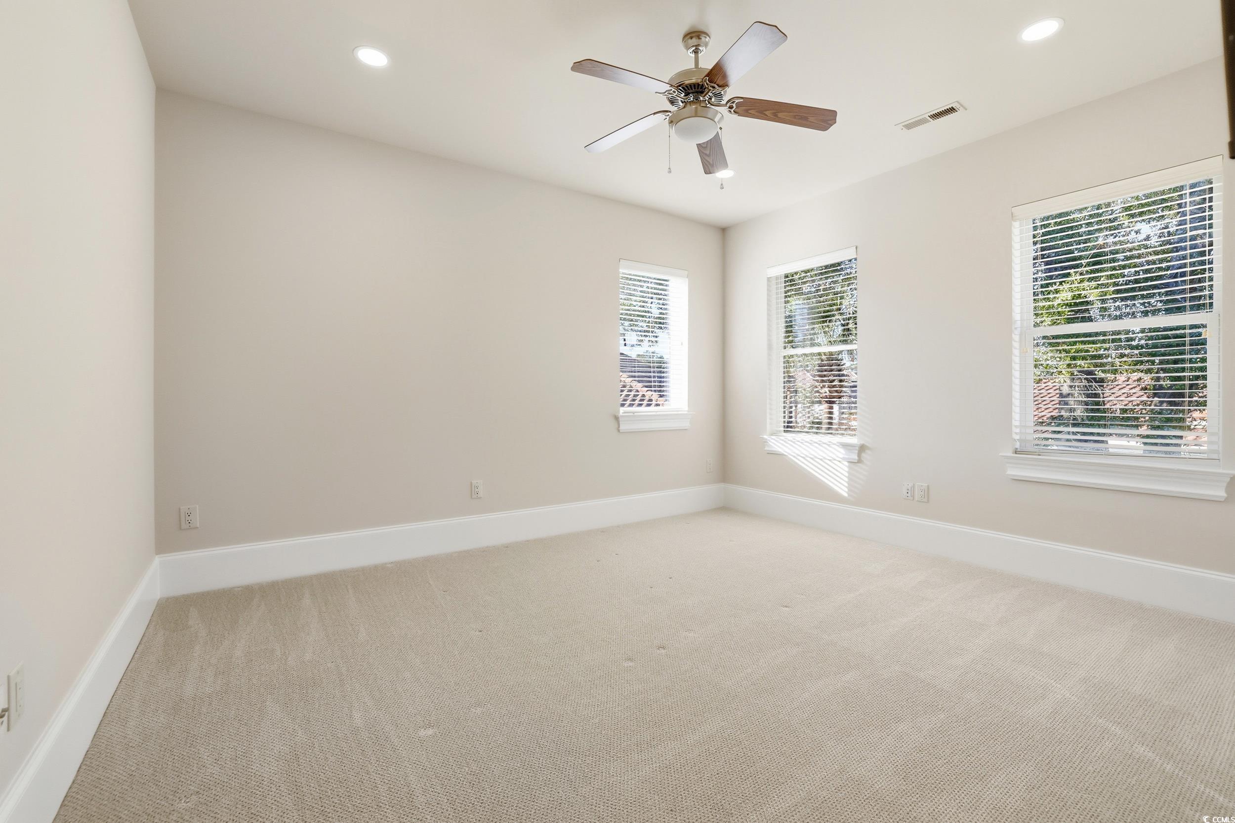 345 Posada Drive Myrtle Beach, SC 29572 - Photo 23 of 40 Upstairs Guest room 2 featuring recessed lighting, light colored carpet, and a ceiling fan