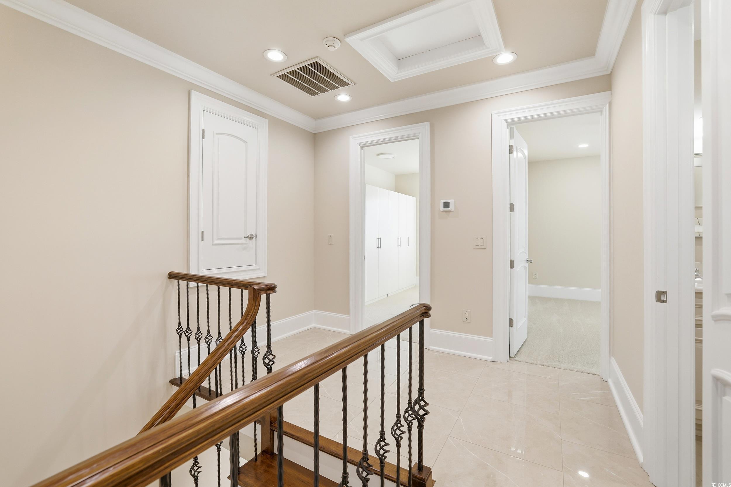 345 Posada Drive Myrtle Beach, SC 29572 - Photo 27 of 40 Hall with ornamental molding, recessed lighting, attic access, an upstairs landing, and light tile patterned floors