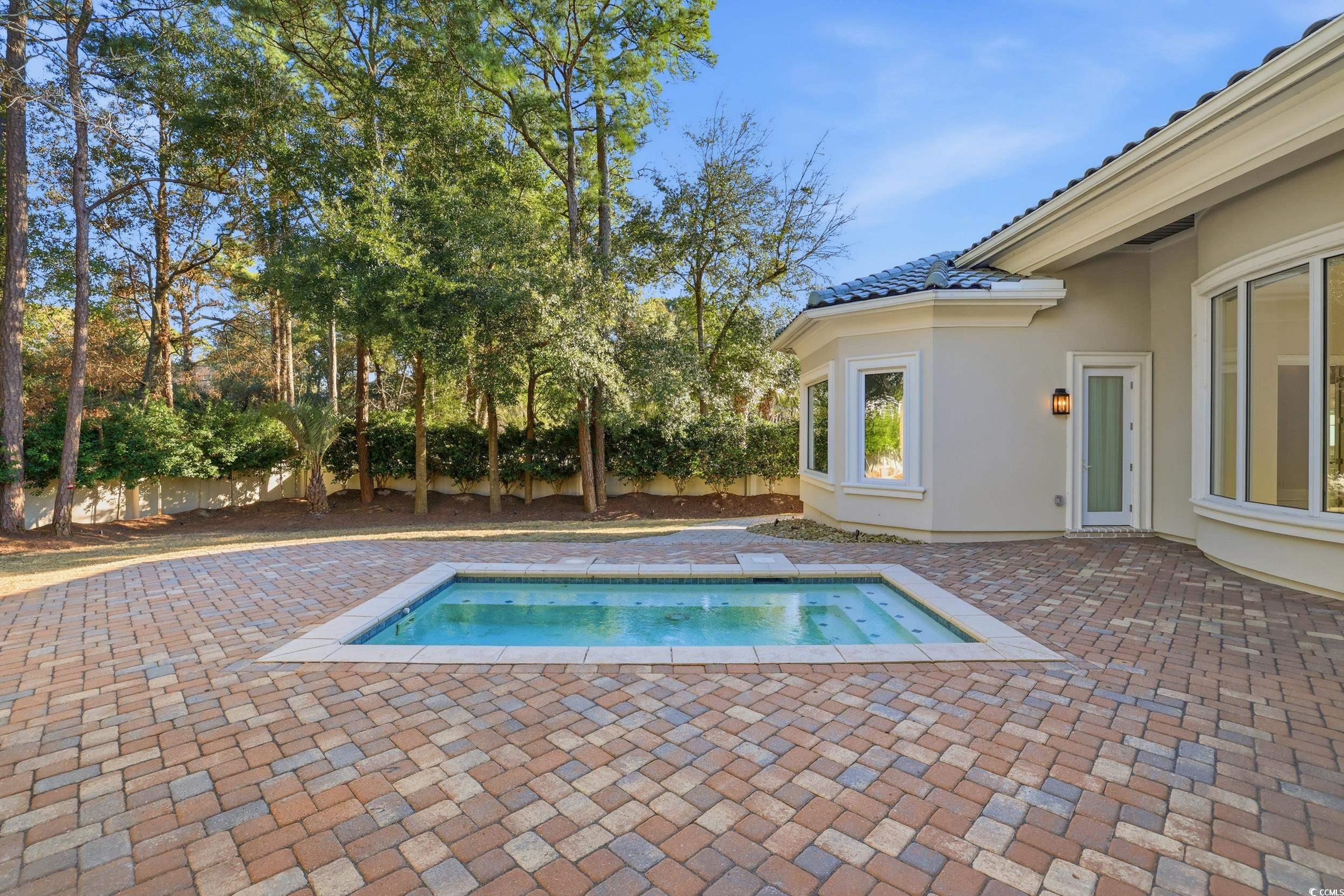 345 Posada Drive Myrtle Beach, SC 29572 - Photo 29 of 40 Small pool with Swimming feature. Ideal for floating too! large patio, a private fenced backyard