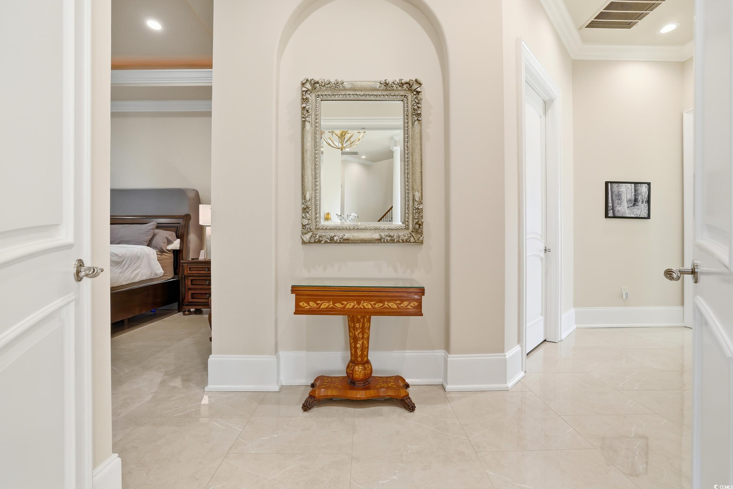 345 Posada Drive Myrtle Beach, SC 29572 - Photo 8 of 39 Corridor featuring ornamental molding and recessed lighting