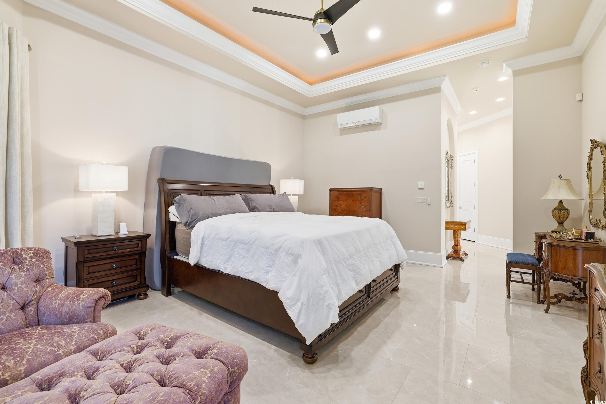 345 Posada Drive Myrtle Beach, SC 29572 - Photo 9 of 39 Primary Bedroom with a raised ceiling, recessed lighting, ornamental molding, and a ceiling fan