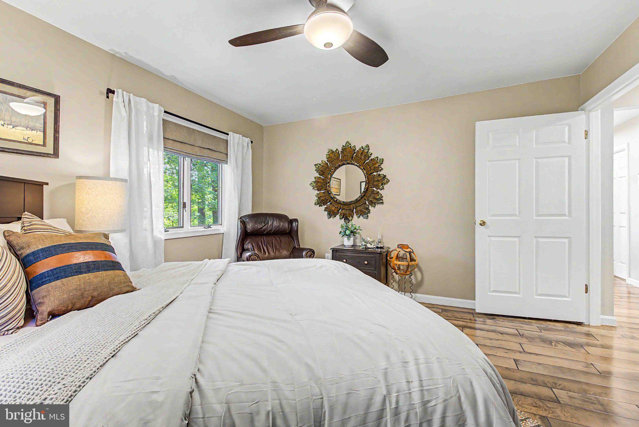 1001 Penn Point Road Oakland, MD 21550 - Photo 38 of 61 Serene bedroom with natural light.