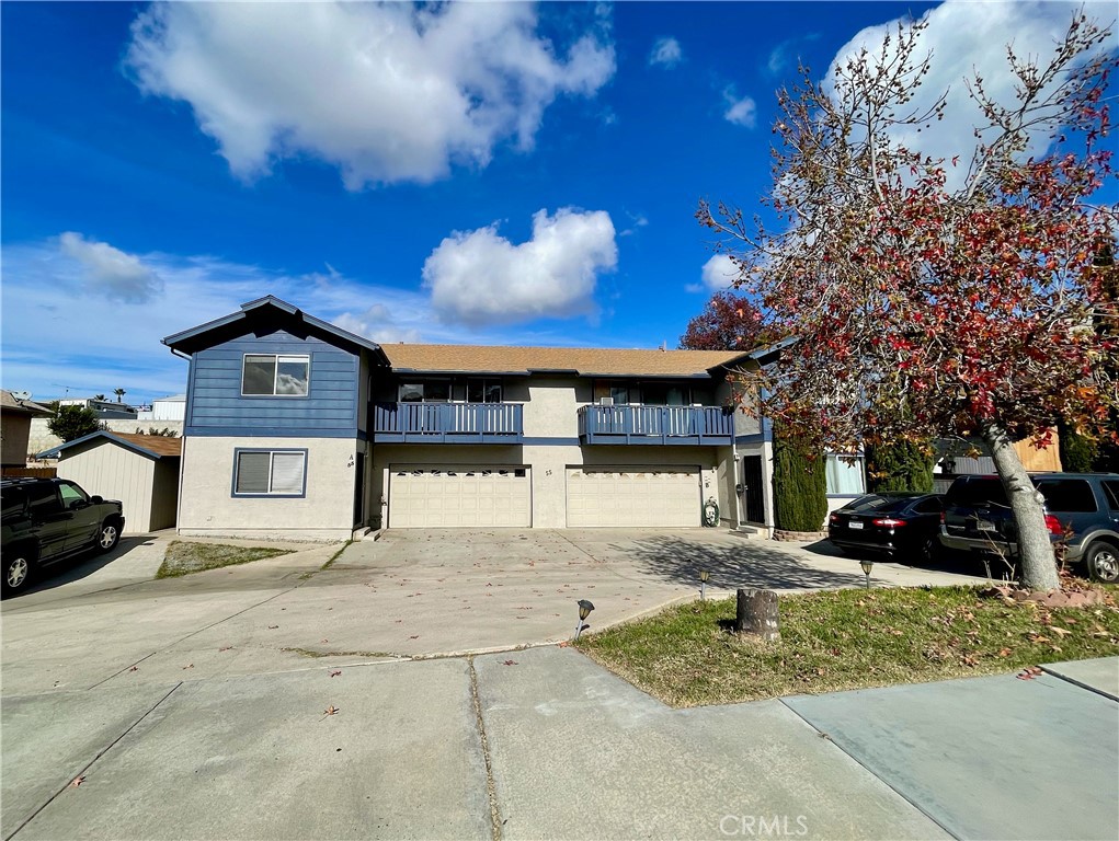 55 Tranquilo Lane Chula Vista, CA 91911 - Photo 1 of 29 a view of a building with a yard
