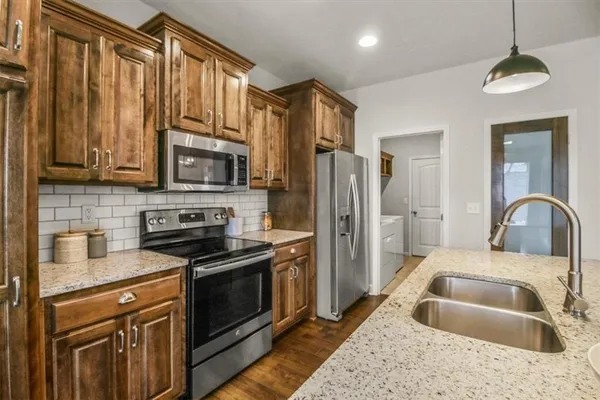 $361,900 | 2621 Northeast Sonora Valley Drive, Blue Springs, MO 64014