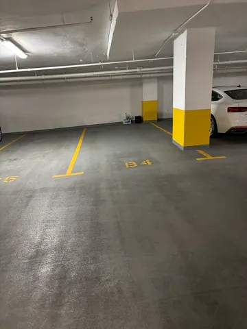 a view of an empty room with a fireplace