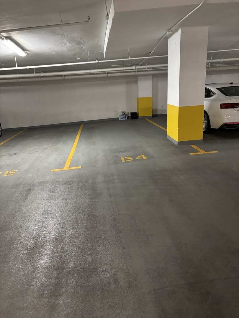 405 North Wabash Avenue, Unit B4 Chicago, IL 60611 - Photo 4 of 7 a view of an empty room with a fireplace