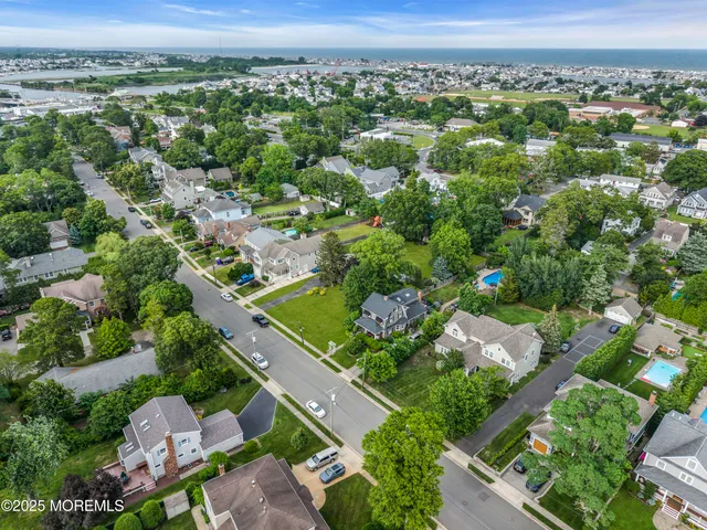 an aerial view of a city with lots of residential buildings