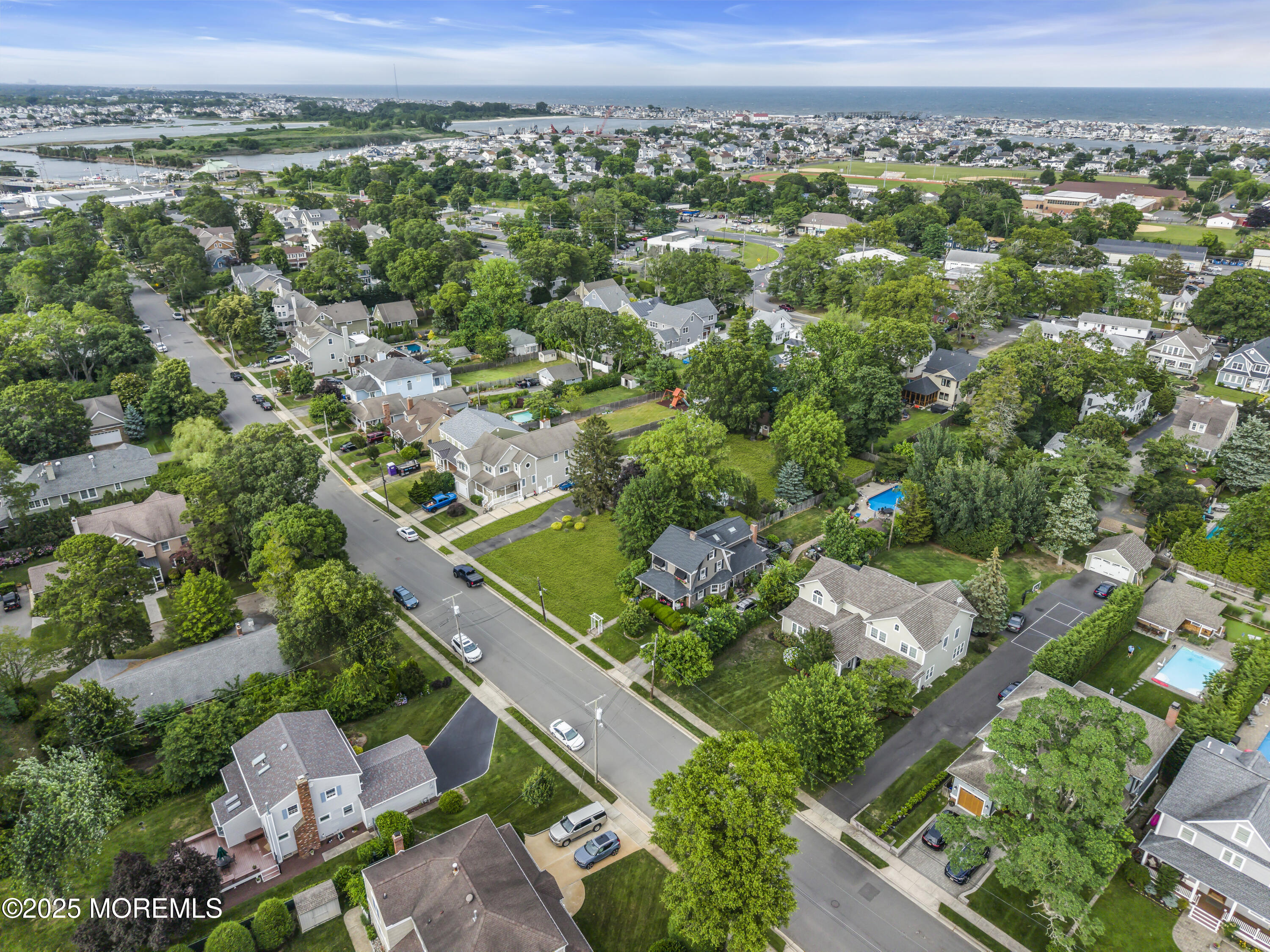 326 Curtis Avenue, Unit LOT 27 Point Pleasant Beach, NJ 08742 - Photo 11 of 11 an aerial view of a city with lots of residential buildings