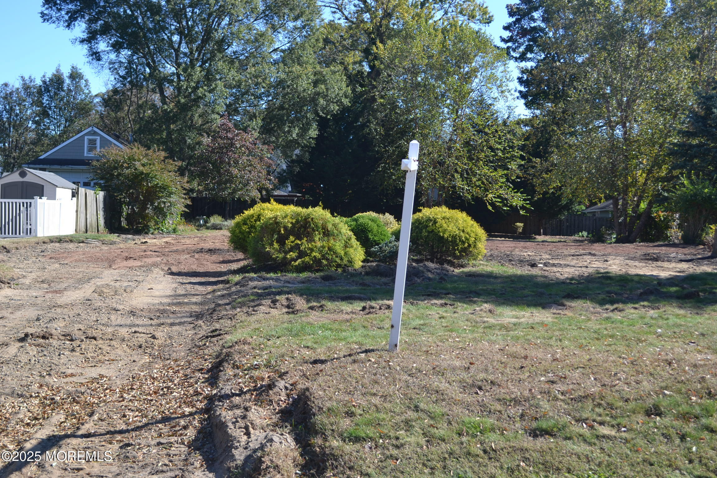 326 Curtis Avenue, Unit LOT 27 Point Pleasant Beach, NJ 08742 - Photo 3 of 11 a backyard of a house with lots of green space
