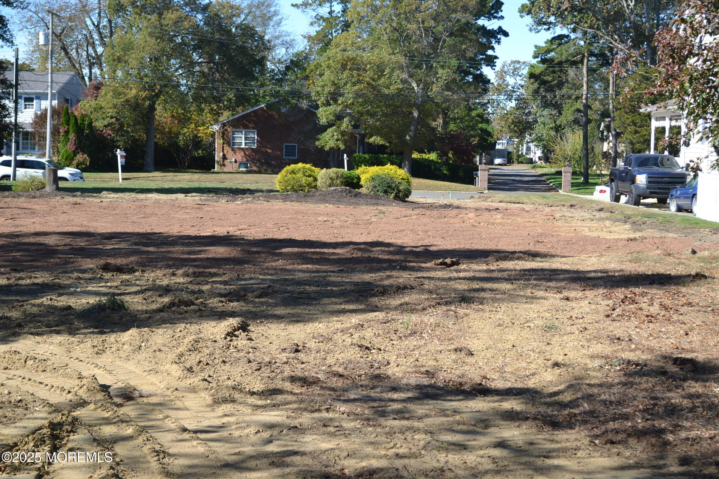 326 Curtis Avenue, Unit LOT 27 Point Pleasant Beach, NJ 08742 - Photo 4 of 11 a view of a yard with a house
