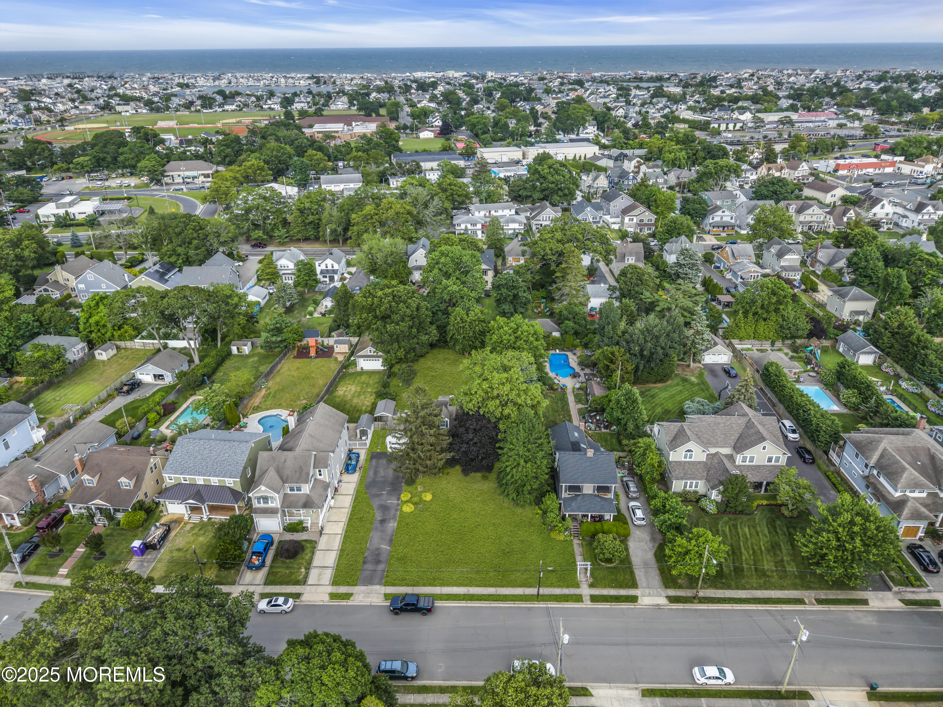 326 Curtis Avenue, Unit LOT 27 Point Pleasant Beach, NJ 08742 - Photo 6 of 11 an aerial view of residential houses with outdoor space