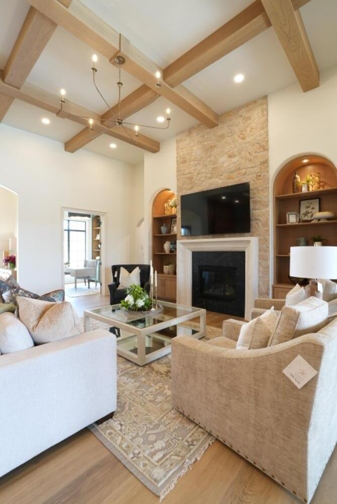 4101 149th Street Lubbock, TX 79423 - Photo 20 of 53 a living room with furniture and a fireplace