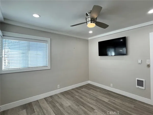a view of a livingroom with a flat screen tv