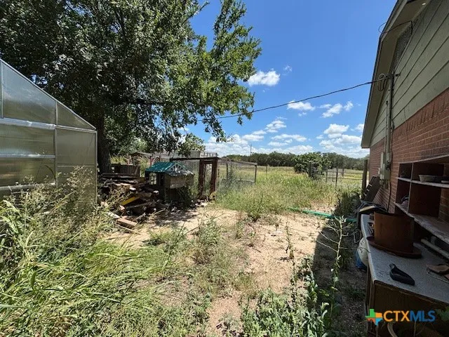 a view of a lake from a yard