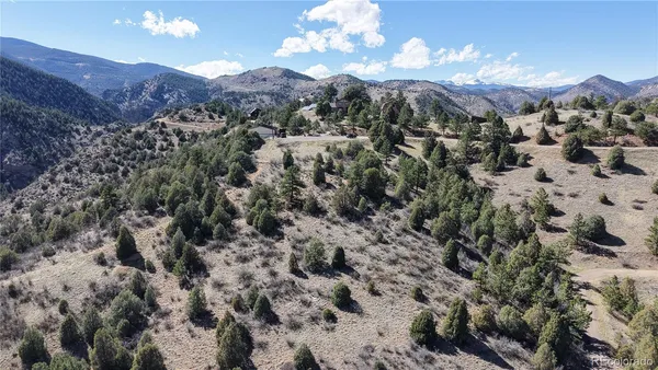 a view of a city with mountains in the background