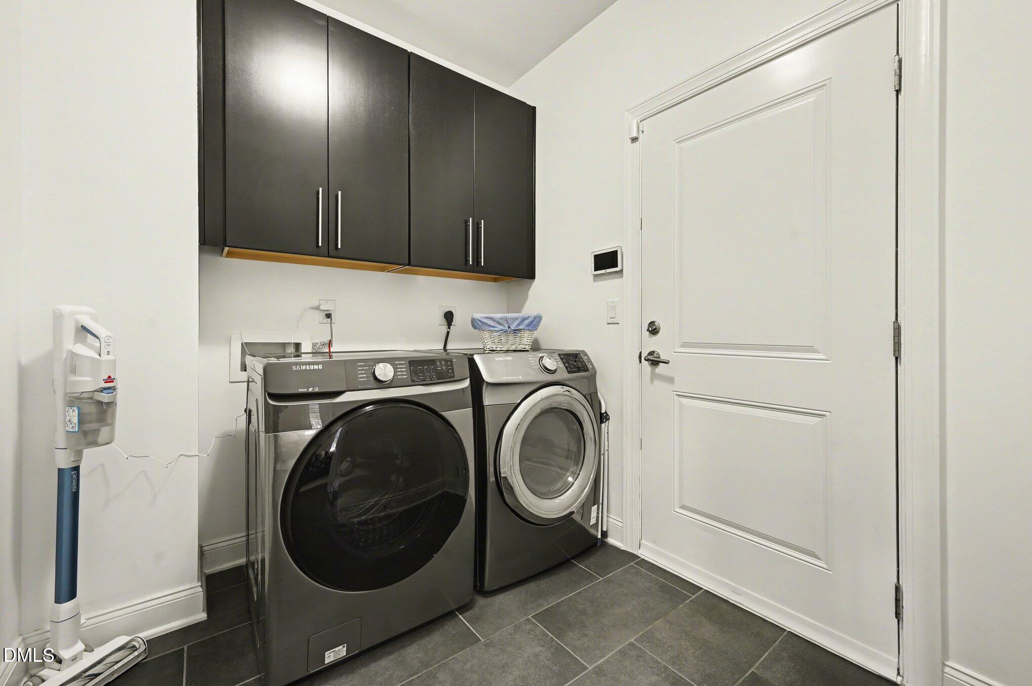 10420 Sablewood Drive, Unit 112 Raleigh, NC 27617 - Photo 22 of 31 a utility room with sink dryer and washer