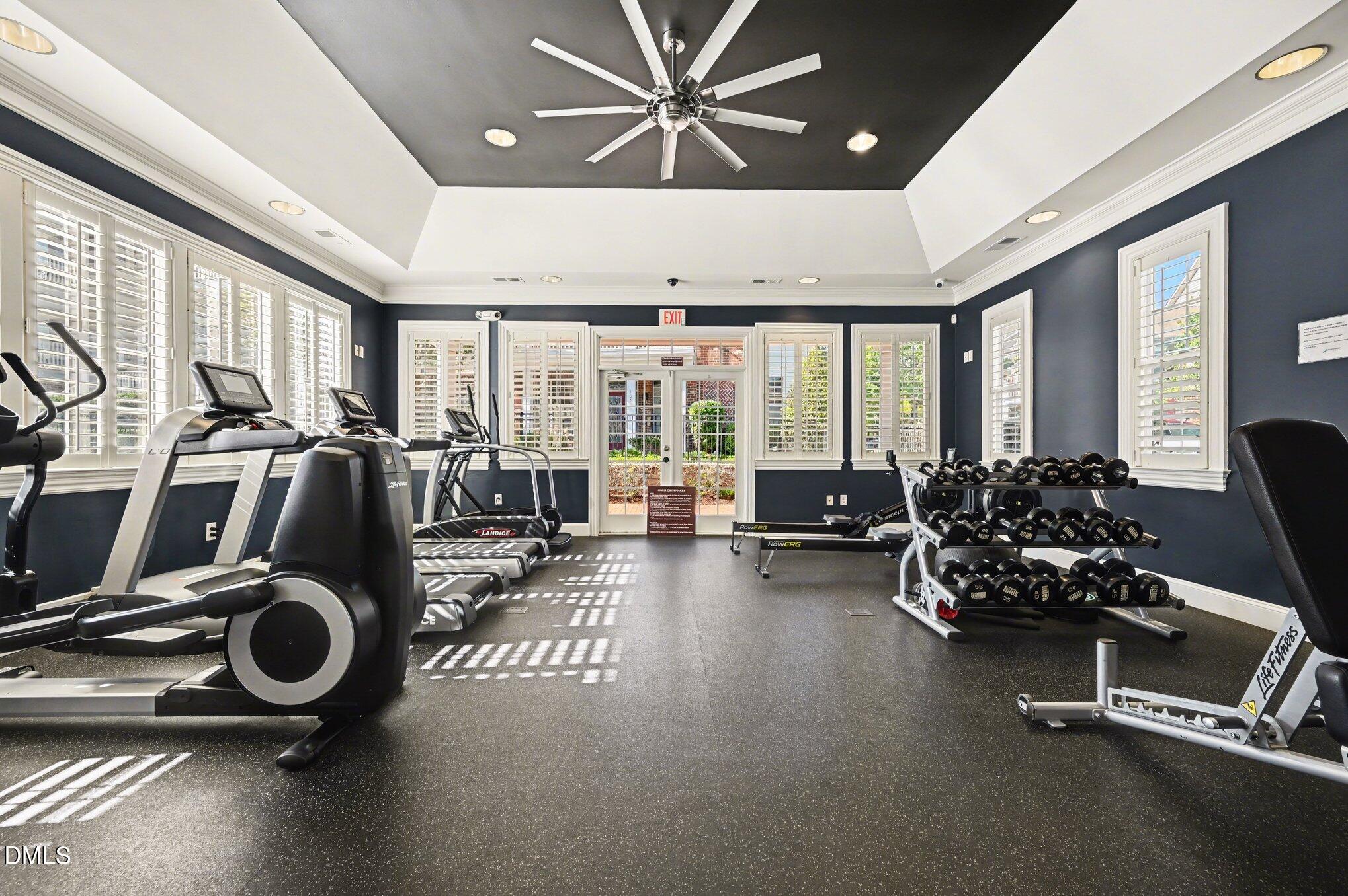 10420 Sablewood Drive, Unit 112 Raleigh, NC 27617 - Photo 23 of 31 a view of a room with gym equipment