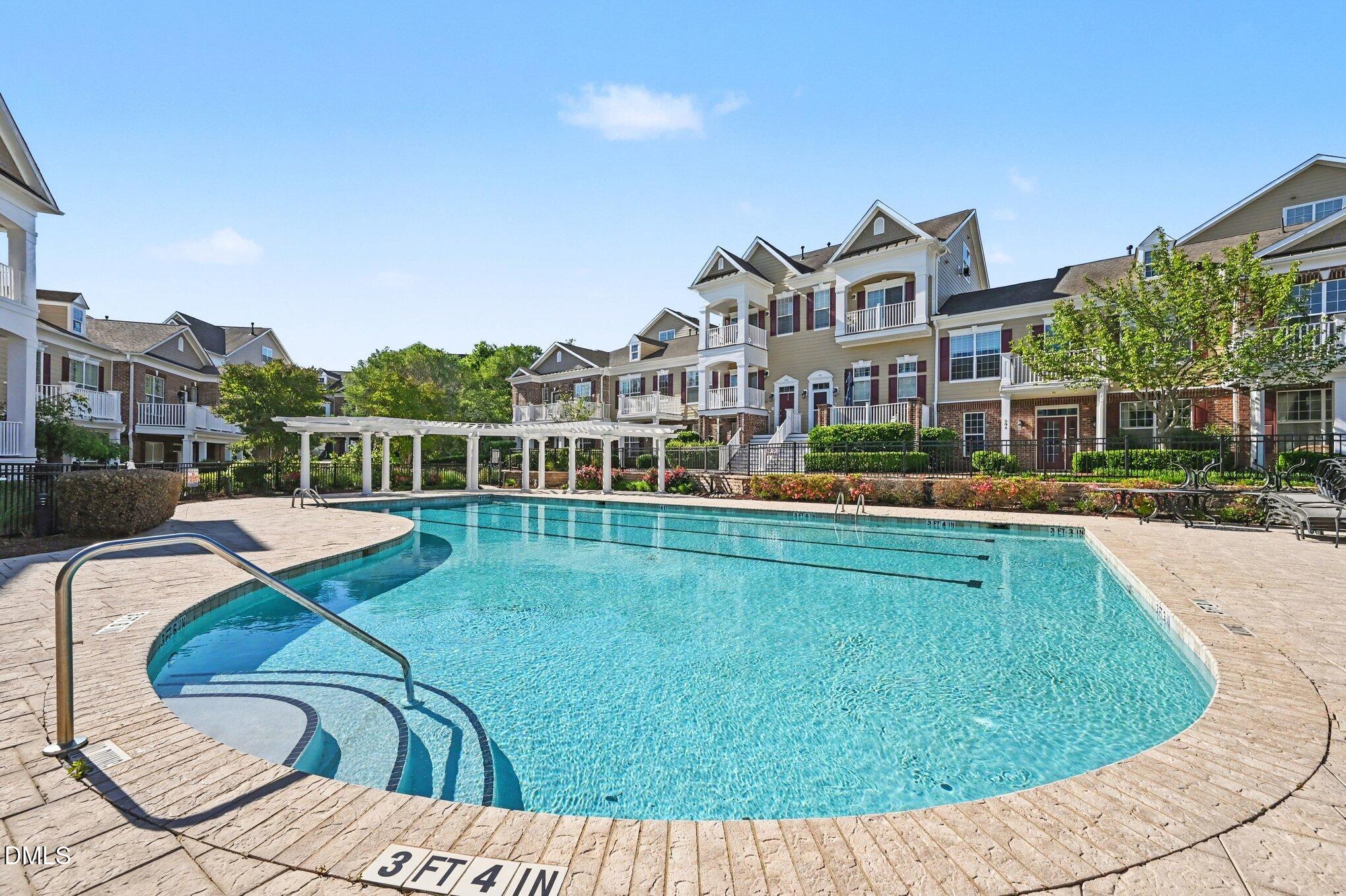 10420 Sablewood Drive, Unit 112 Raleigh, NC 27617 - Photo 27 of 31 a view of a house with a swimming pool