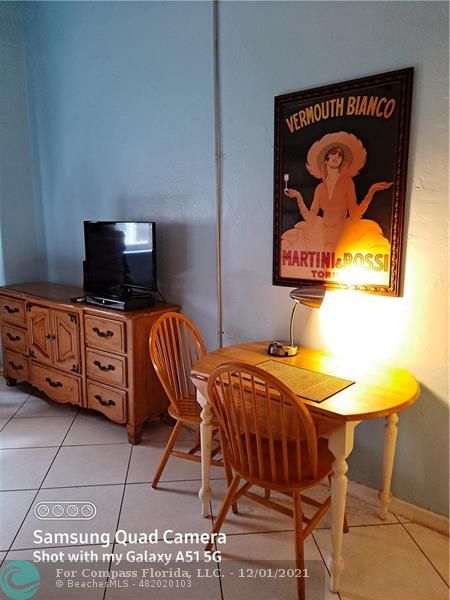 255 West 24th Street, Unit 105 Miami Beach, FL 33140 - Photo 23 of 47 a bedroom with a bed and furniture