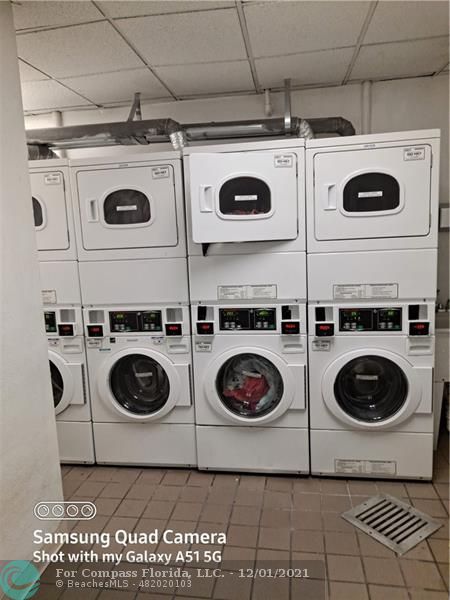 255 West 24th Street, Unit 105 Miami Beach, FL 33140 - Photo 39 of 47 a stove top oven sitting inside of a kitchen and a stove top oven