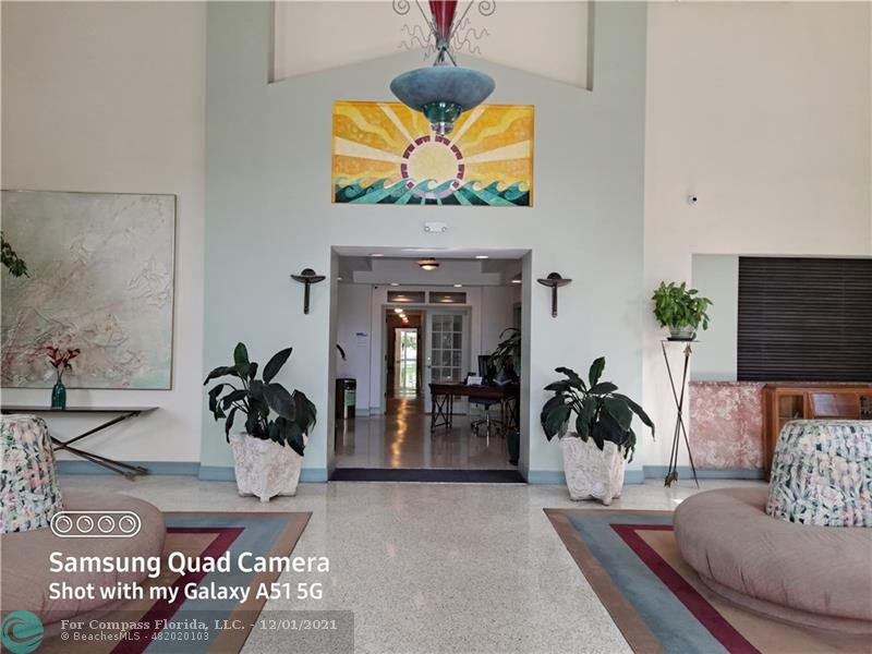 255 West 24th Street, Unit 105 Miami Beach, FL 33140 - Photo 47 of 47 a living room with furniture and a potted plant