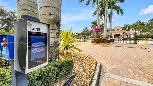 a view of a patio with a table chairs and a flat screen tv