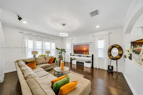 a bed room with furniture and a window