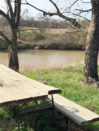 a view of a lake from a yard