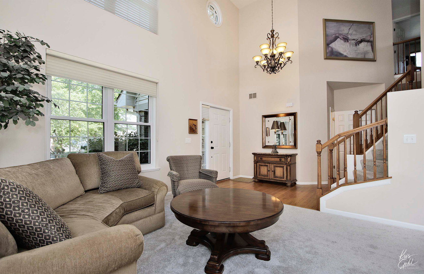 515 Capital Lane Gurnee, IL 60031 - Photo 4 of 32 a living room with furniture and a chandelier